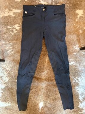 Equiline navy breeches with velvet trim and stitching detail.